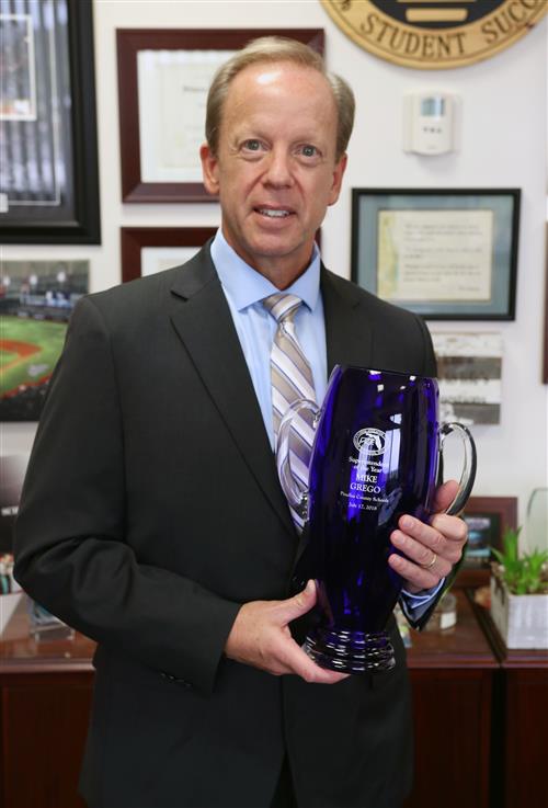 Dr. Grego with 2018 Florida Association for Career and Technical Education Superintendent of the Year Award 